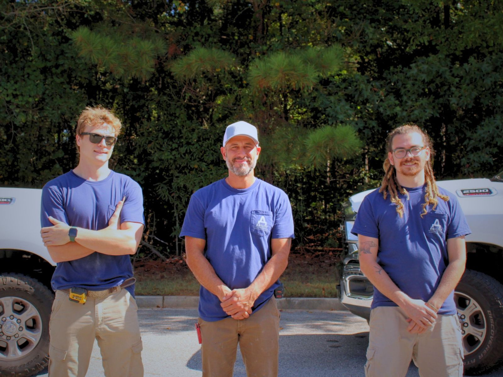 Joseph Soleto with plumbers Ethan Cole and Gavin Cole